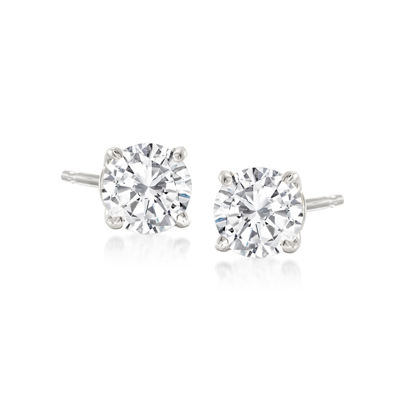 Round diamond stud earrings in 14kt white gold, secure post backs.