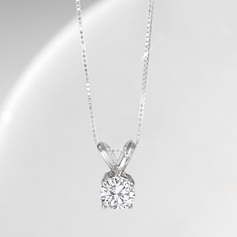 Solitaire diamond pendant necklace with round center stone in V-prong setting