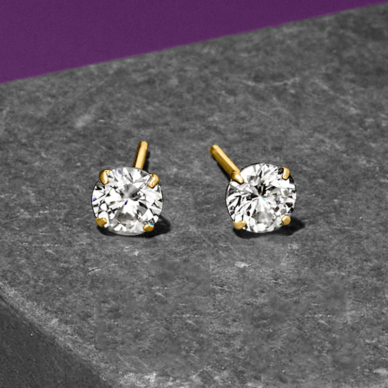 Round CZ stud earrings in 14kt yellow gold with small gold posts