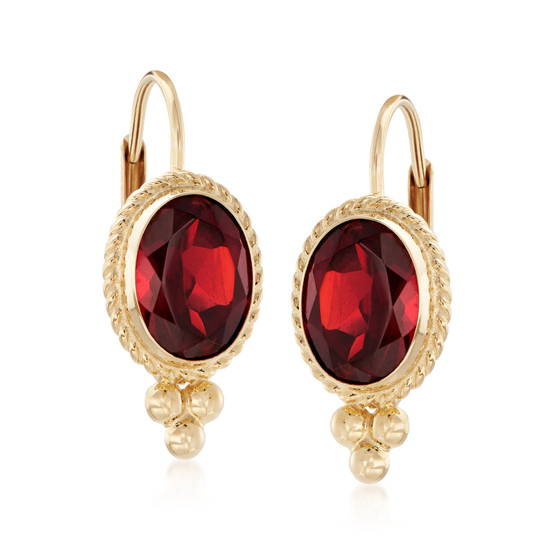 14kt yellow gold drop earrings with oval red garnet, roped bezel and leverback closure