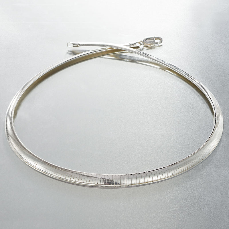 Sterling silver omega necklace with lobster clasp and coiled snake-chain profile