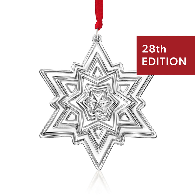 Towle sterling silver star ornament with hanging red ribbon, 28th edition