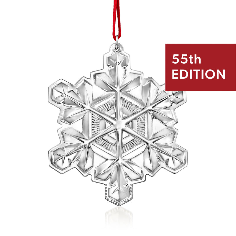 Sterling silver snowflake ornament, 55th edition, with red hanging ribbon