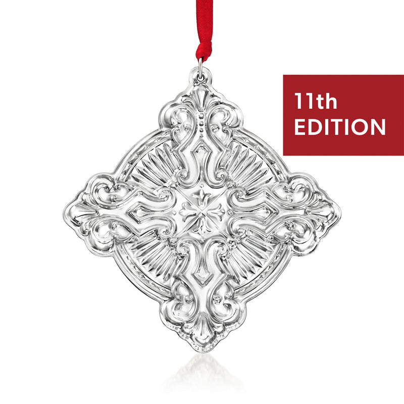 Sterling silver cross ornament with ornate filigree design, 11th edition, red ribbon loop