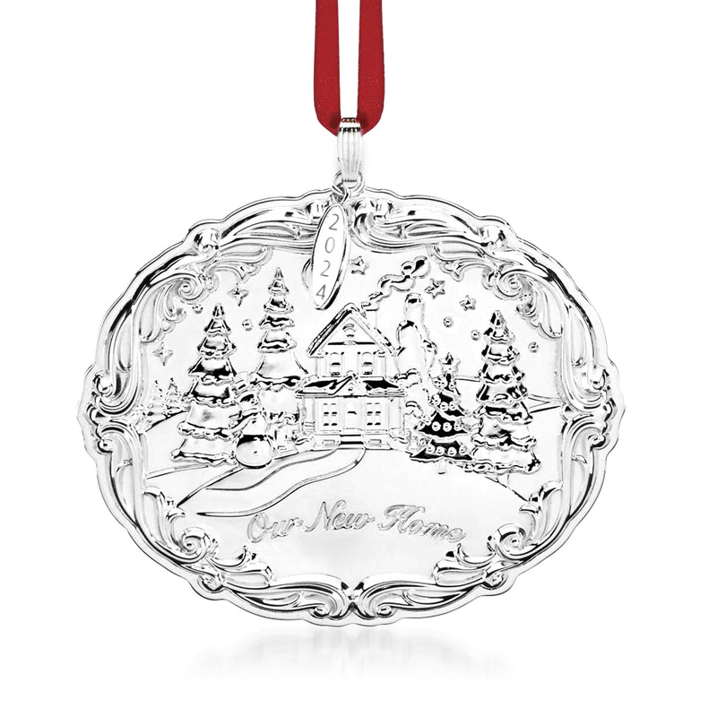 Sterling silver oval ornament with ribbon top, house scene and pine tree details