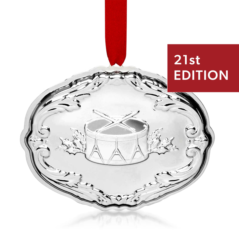 Sterling silver drum-themed Christmas ornament, 21st edition with red ribbon