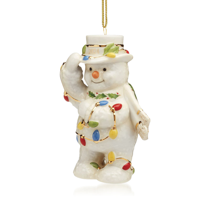 Lenox porcelain snowman Christmas ornament, colorful light garland, hanging gold loop