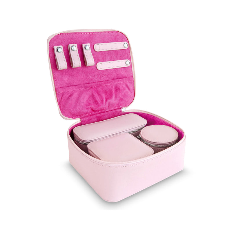 Pink bento travel jewelry case with open roll compartments and snap closure