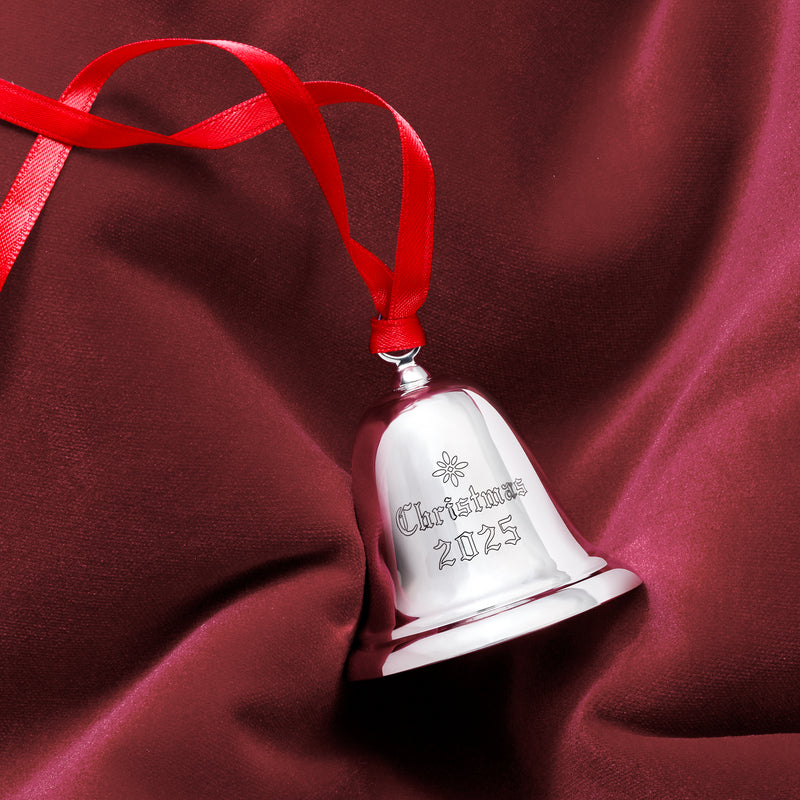 Sterling silver Christmas bell ornament, side view with red ribbon and 'Christmas 2025'