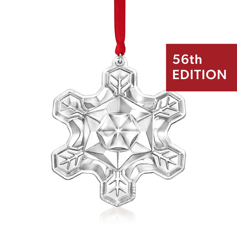 Sterling silver snowflake ornament with red ribbon, 56th edition