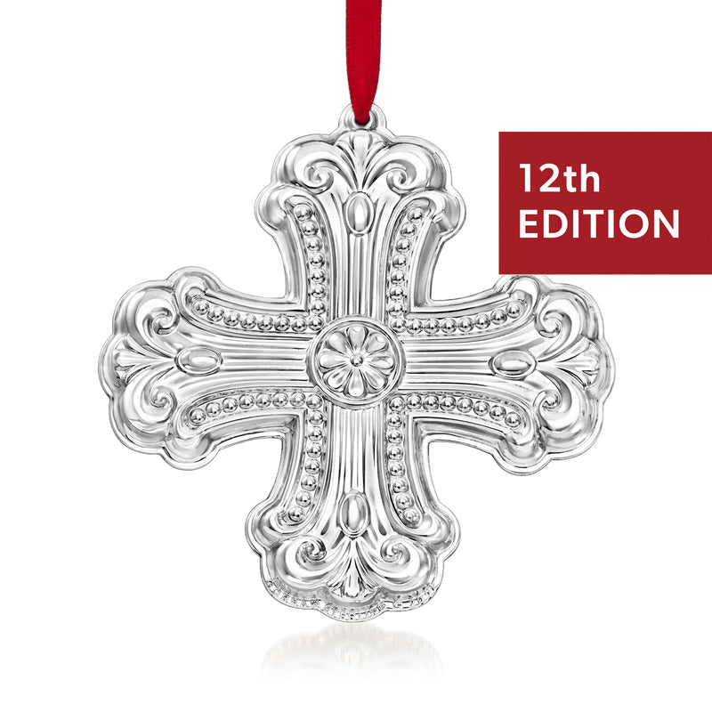 Gorham sterling silver cross ornament with ornate scrollwork, hanging by red ribbon, 12th edition