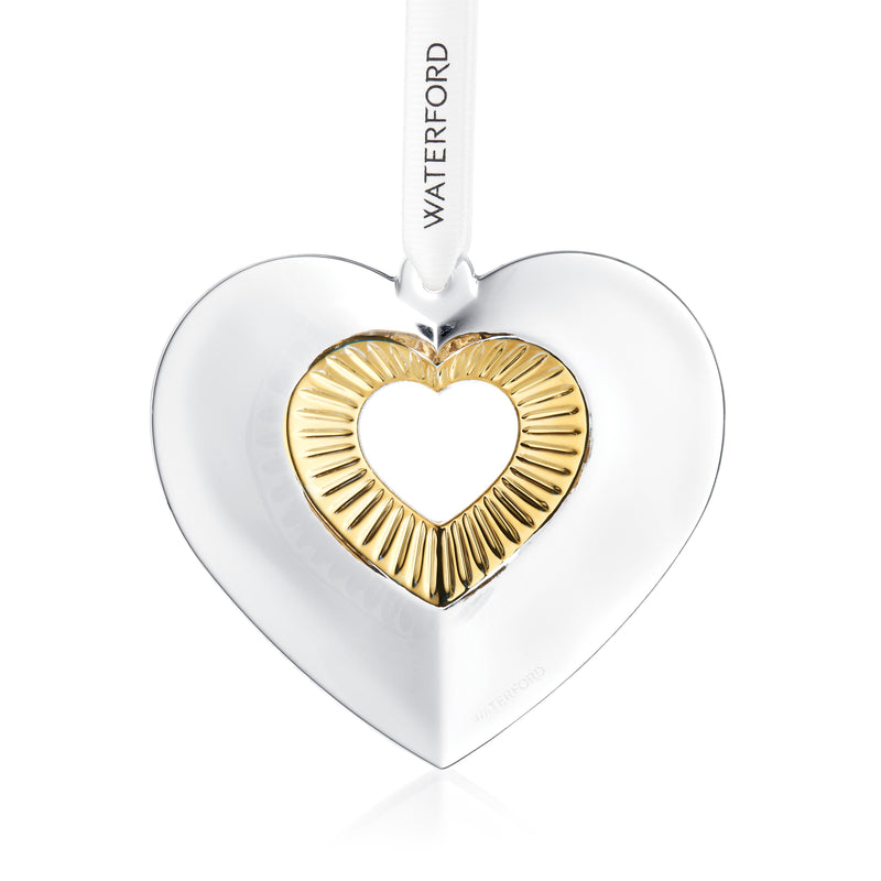 Goldtone and clear glass heart ornament with white faceted frame, hanging from ribbon
