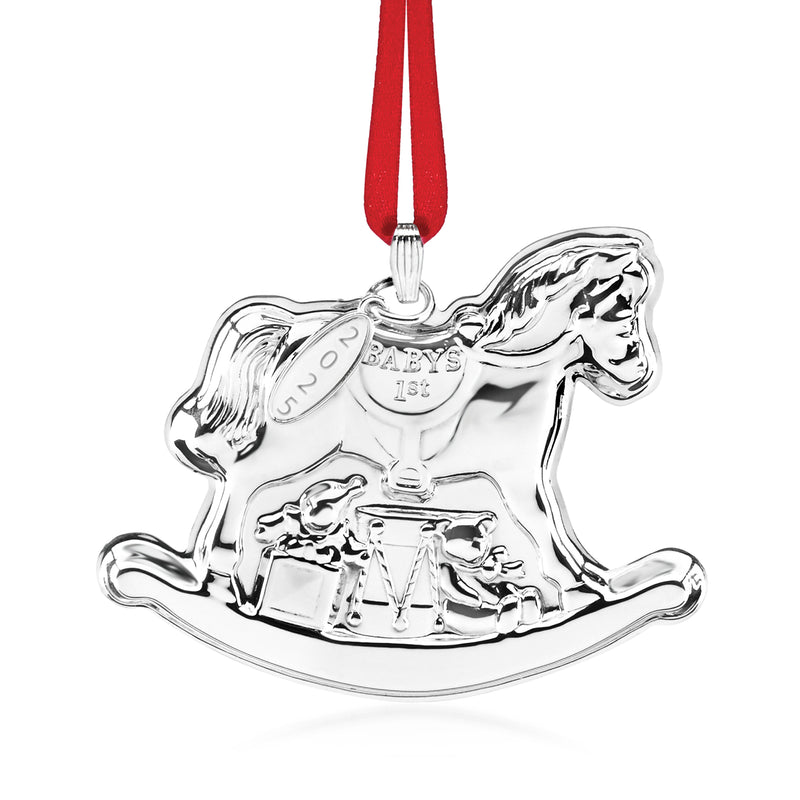 Sterling silver rocking horse ornament with red ribbon, engraved “Baby’s First”