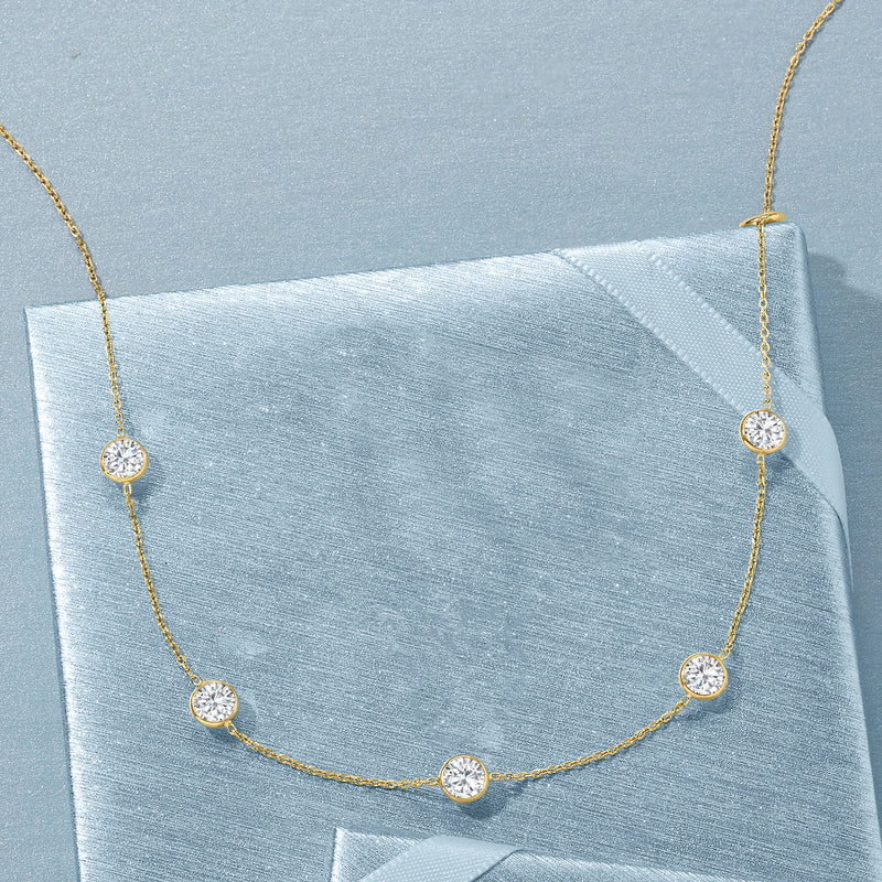 14kt yellow gold CZ station necklace with round stones set along fine chain