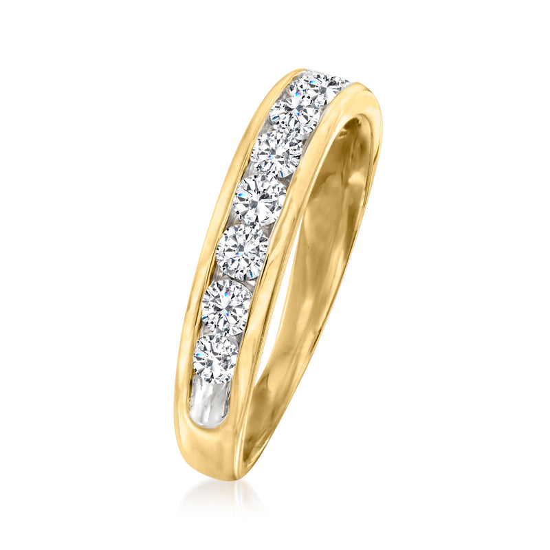 Yellow gold diamond wedding band side view with channel-set round stones and high polish