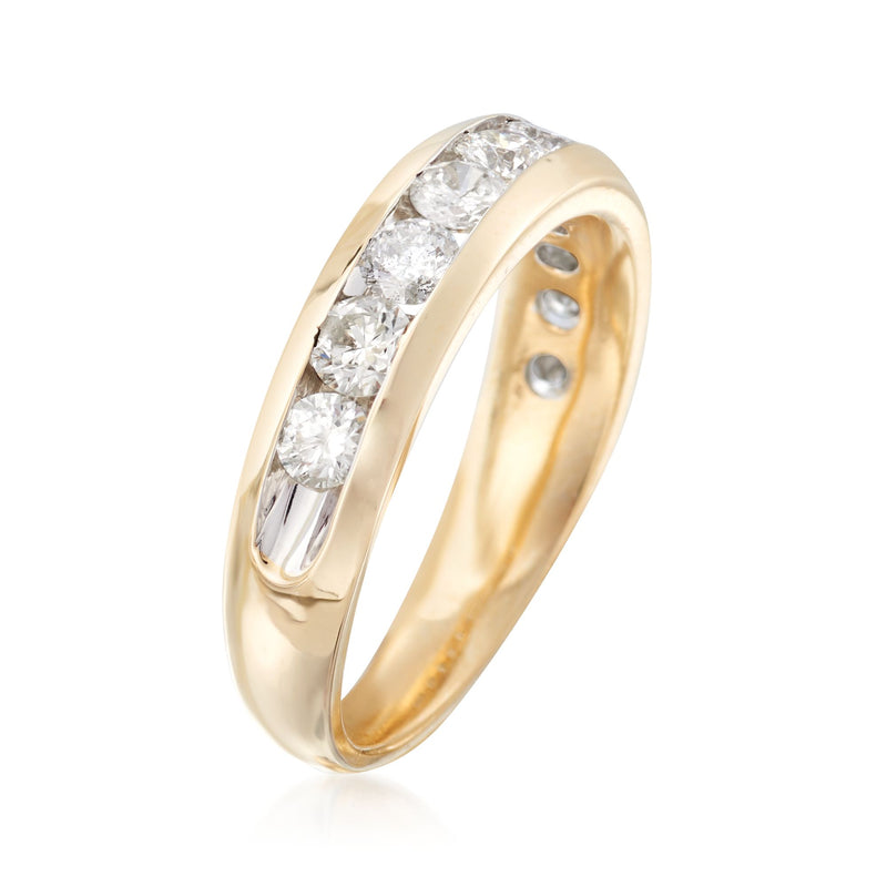 Yellow gold diamond ring with arched band and round stones on top edge