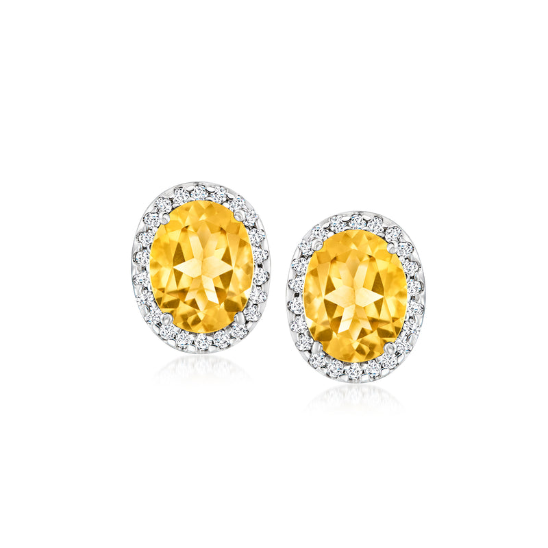 Oval citrine stud earrings with diamond halo, 14kt white gold post backs