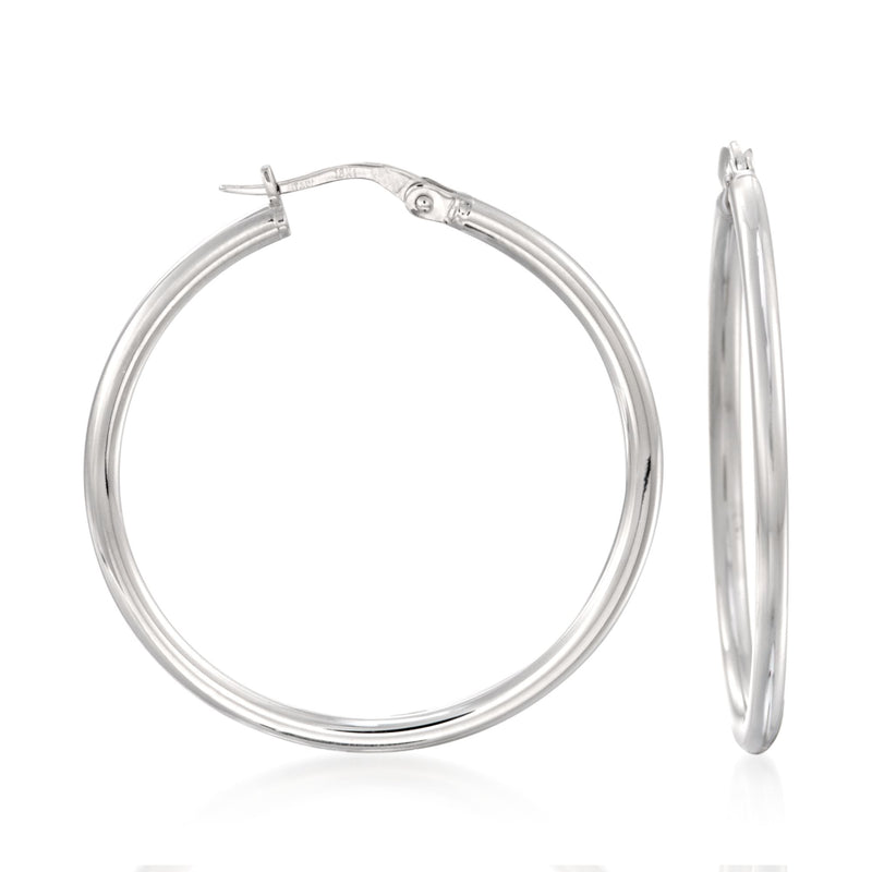 18kt white gold hoop earrings, hinged clasp with small decorative detail