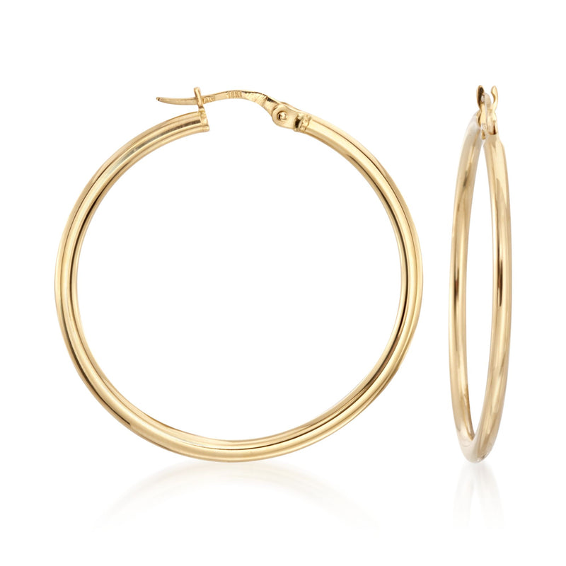 18kt yellow gold hoop earrings with hinged clasp and slim polished profile