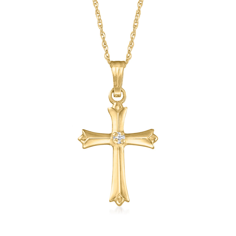 Yellow gold cross pendant necklace with single diamond, attached to a chain