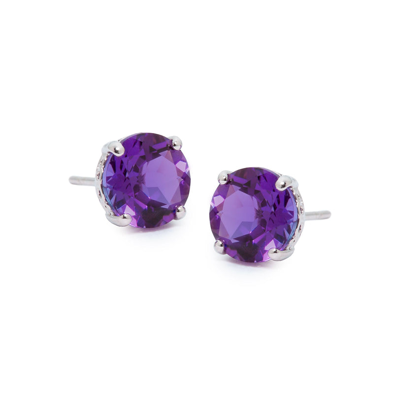 Amethyst stud earrings, 14kt white gold with oval purple gemstones