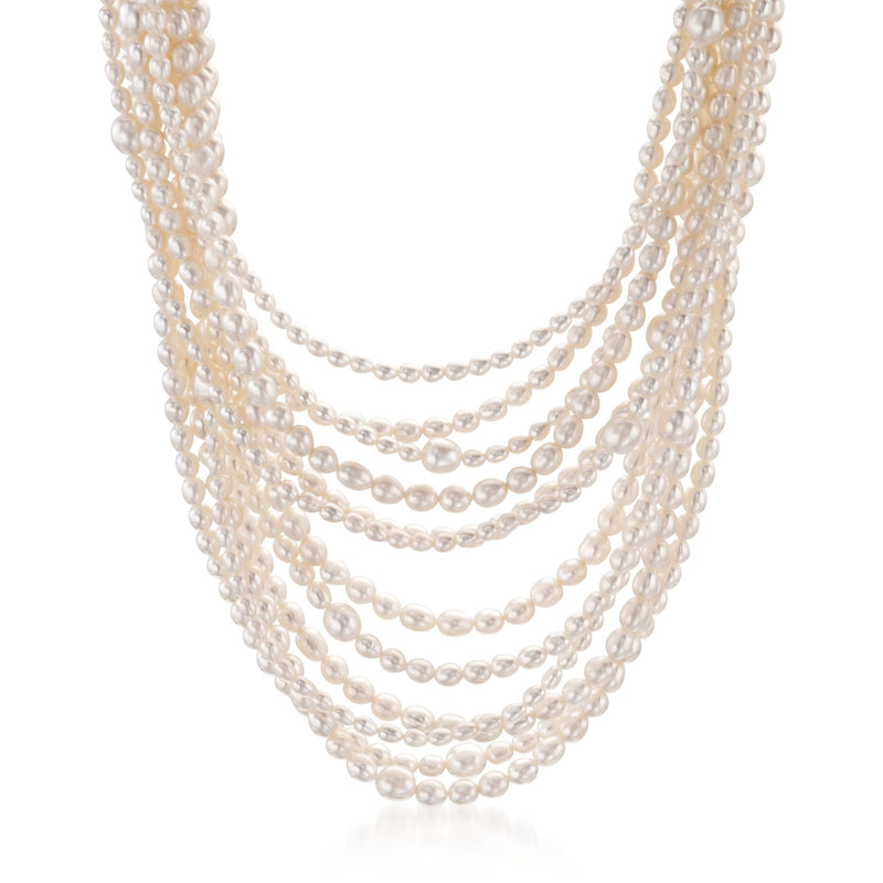 Multi-strand cultured pearl necklace with off-white pearls and sterling silver clasp