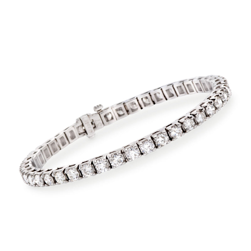 14kt white gold tennis bracelet with rectangular diamond settings along the band