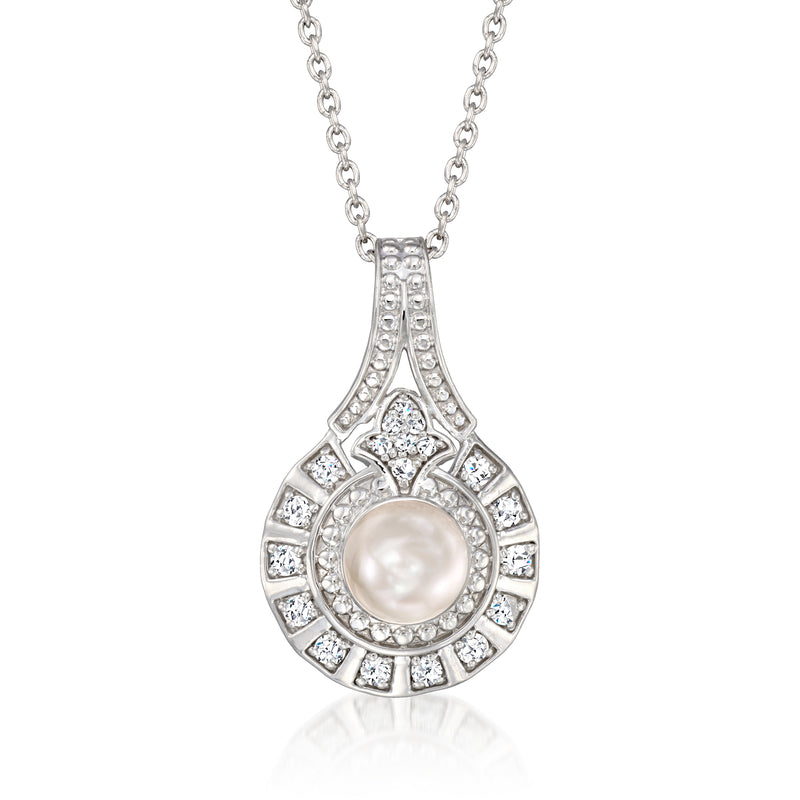 Cultured pearl and diamond pendant necklace with teardrop halo setting on silver chain