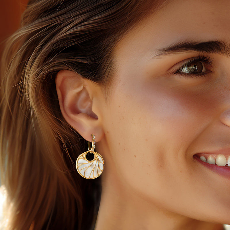 Mother-of-pearl circle hoop drop earring with gold-tone and white topaz accents