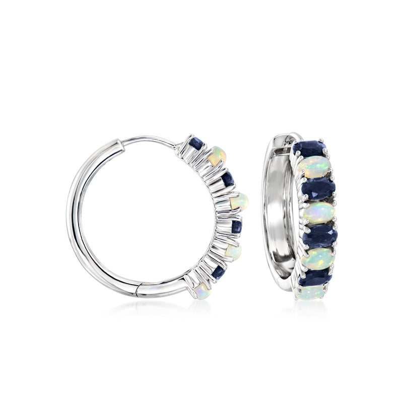Sterling silver hoop earrings with opal-like stones and blue sapphire accents