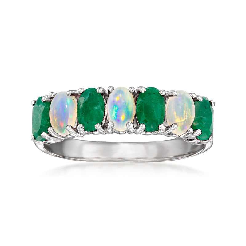 Sterling silver ring with oval green gemstones and opal accents, set with small clear stones