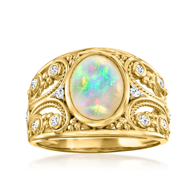 Gold opal cabochon ring with round clear stones, ornate halo setting