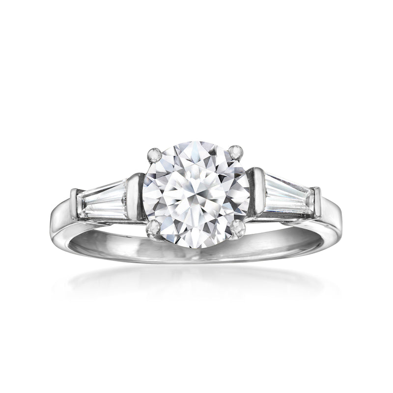 14kt white gold diamond ring with round center stone and baguette side stones