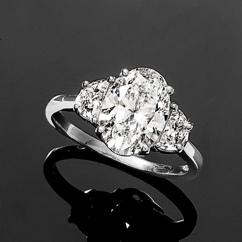 14kt white gold oval lab-grown diamond ring with prong-set side stones