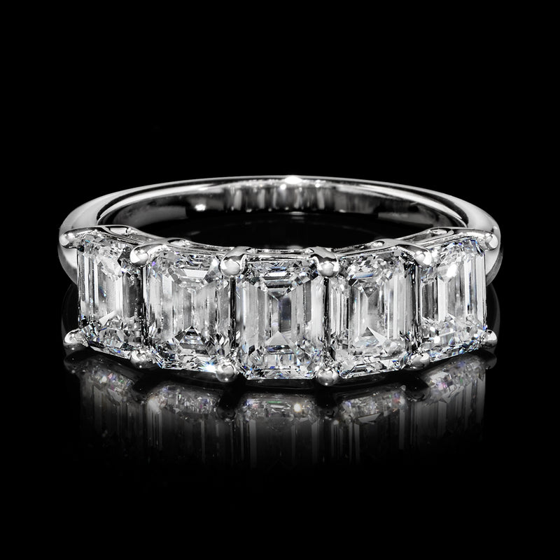 Front view five emerald-cut diamonds on a 14kt white gold band, five-stone ring.