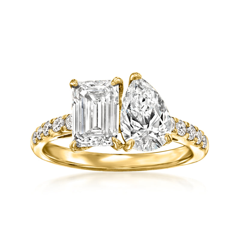 Two-stone toi et moi diamond ring in 14kt yellow gold, emerald-cut and pear-shaped stones