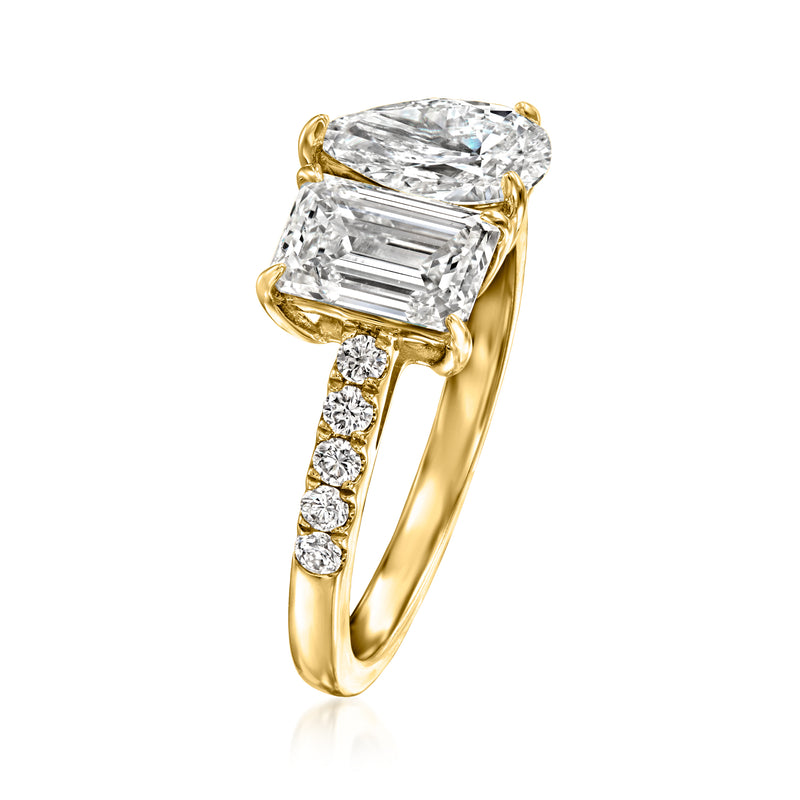 14kt yellow gold toi et moi ring with emerald-cut stones and round diamond accents