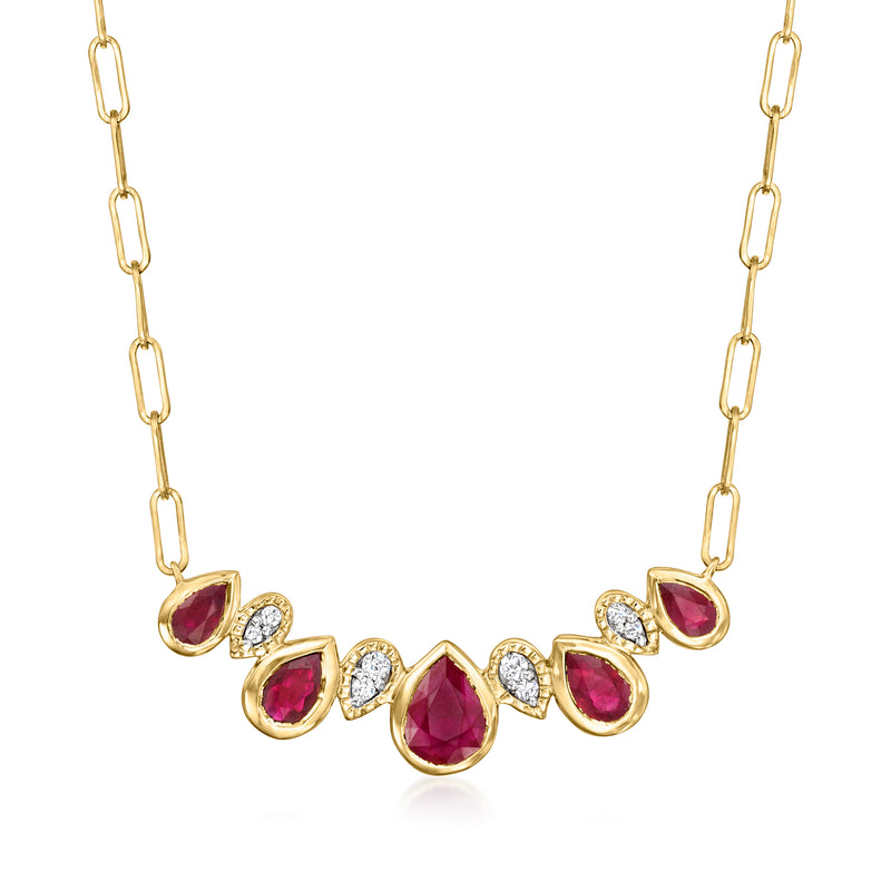 Yellow gold teardrop necklace with ruby and diamond accents on a link chain
