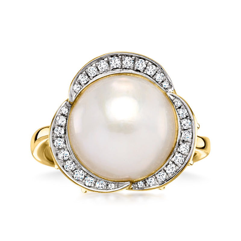 Oval Mabe pearl ring with diamond halo in 18kt gold over sterling