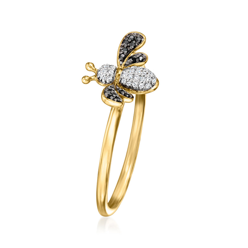 Gold-tone bee ring with textured black wings and bright white center stones