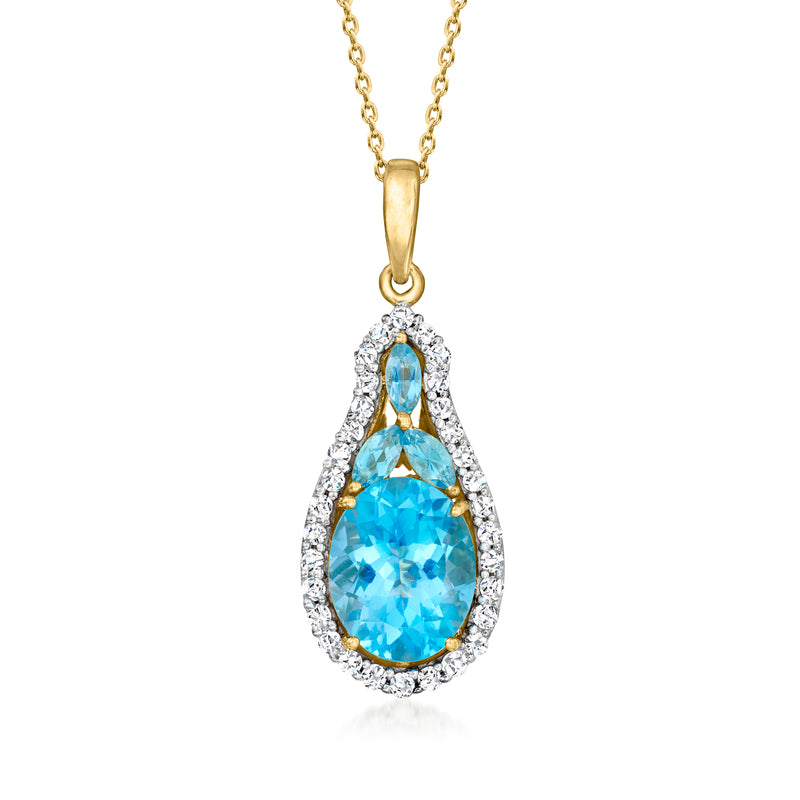 14kt yellow gold pendant necklace with blue teardrop topaz and diamond halo