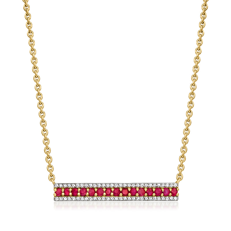 Gold bar necklace with red and clear zircon stones on a rectangular center pendant