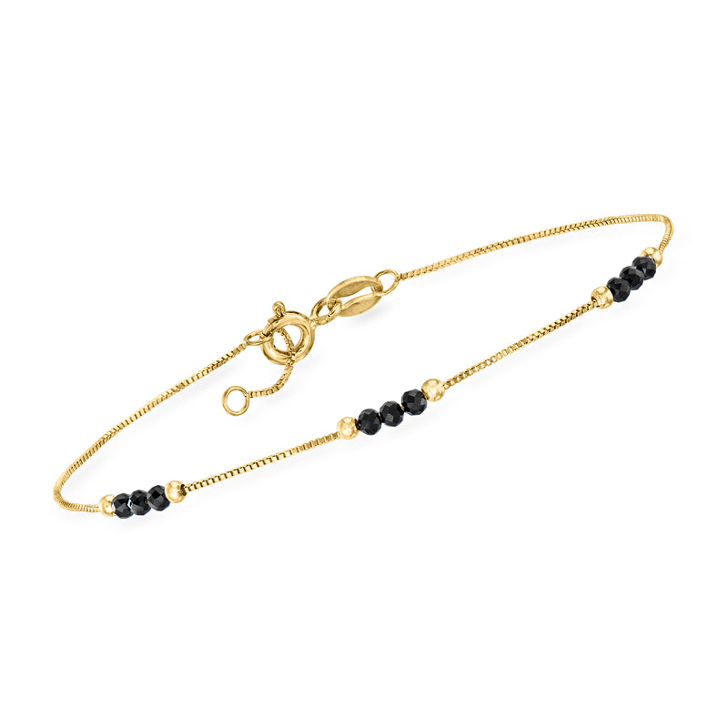 14kt yellow gold onyx bead station bracelet with three black bead accents