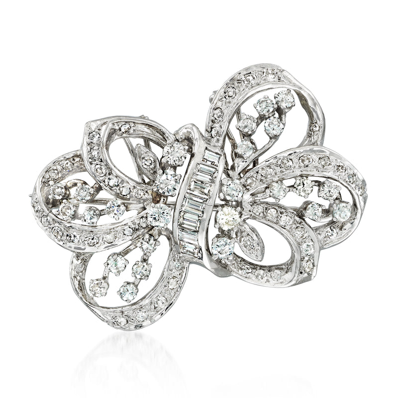 Diamond bow pin in 14k white gold with round stones and detailed ribbon bow
