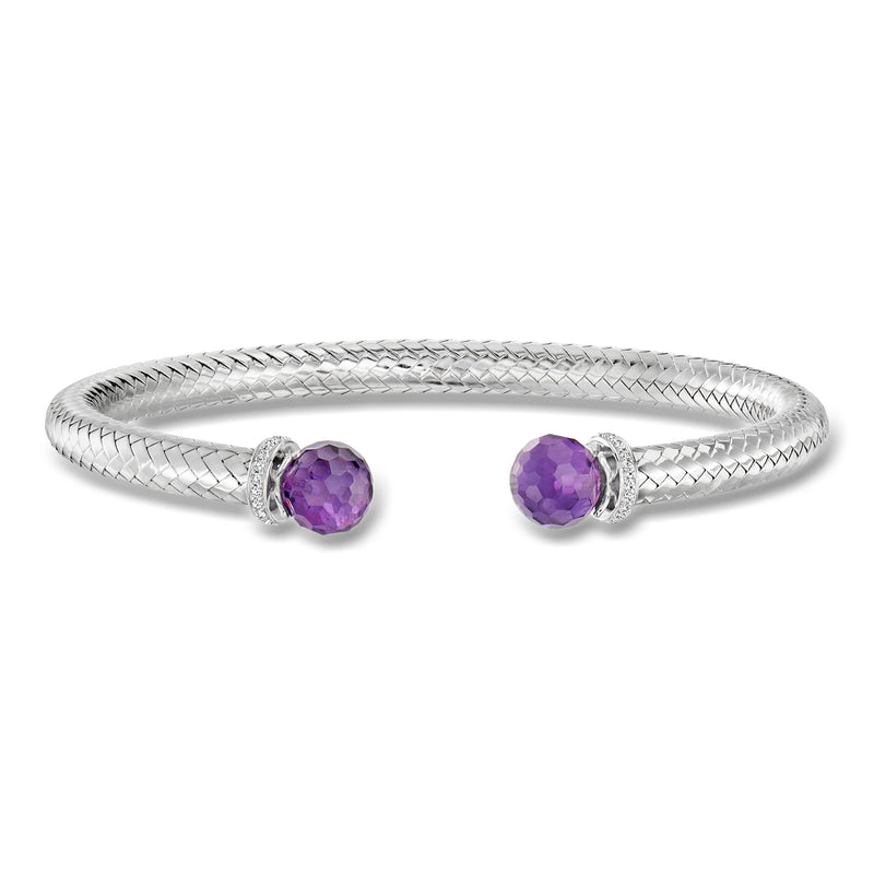 Sterling silver cuff bracelet with two round purple amethyst stones and CZ accents