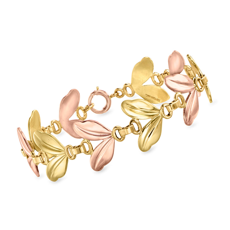 Two-tone 14kt gold leaf bracelet with pink-gold leaf charms and round links