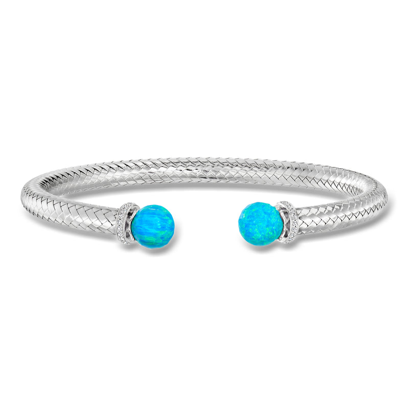 Sterling silver cuff bracelet with woven mesh and two blue opal-like beads