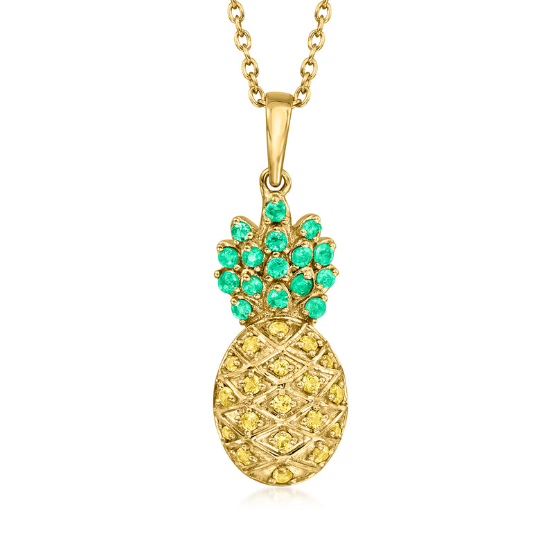 Gold pineapple pendant necklace with green gemstone crown and yellow enamel body