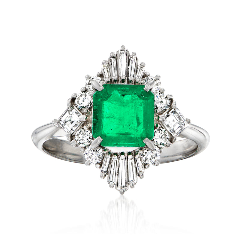 Platinum vintage style ring with square emerald center and diamond halo and side stones