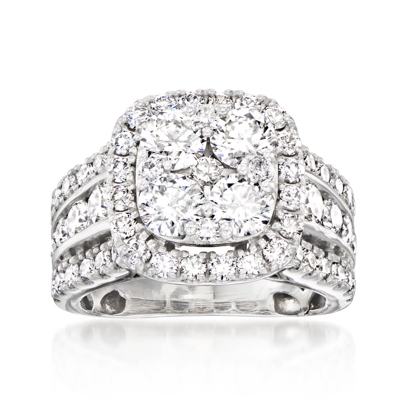Vintage diamond ring in 14kt white gold with cluster halo setting